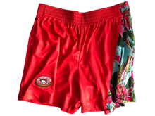 Load image into Gallery viewer, This is a photo of SleeperBear&#39;s bright red athleisure shorts with a stunning blue floral design and a donut patch
