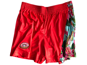 This is a photo of SleeperBear's bright red athleisure shorts with a stunning blue floral design and a donut patch