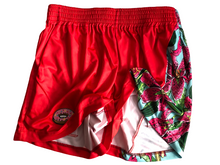 Load image into Gallery viewer, This is a photo showing the front of the SleeperBear Primrose shorts pulled up so you can see the white inside of the soft fabric
